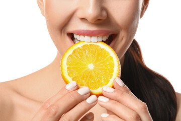 Wall Mural - Beautiful young woman with orange on white background, closeup