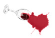 © New Africa - Overturned glass and spilled wine on white background, top view