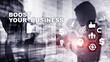 © Funtap - Financial and Technology concept. On a virtual screen inscription: Boost Your Business