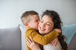 © Dragana Gordic - Son is kissing his mother. The kind of love that can't be described, only felt. Mom and son. Happy mother's day! Mother hugging her child. Adorable little boy affectionately kissing his mother