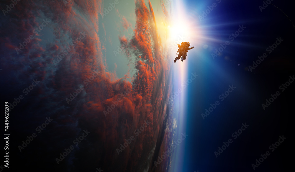 Spaceman and planet, human in space concept . Mixed media Stock Photo ...