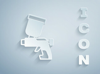 Sticker - Paper cut Paint spray gun icon isolated on grey background. Paper art style. Vector