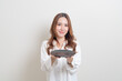 © topntp - portrait beautiful Asian woman holding empty plate