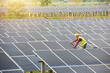 © saravut - engineer working or checking equipment in solar power plant
