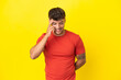 © luismolinero - Young caucasian handsome man isolated on yellow background laughing