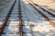 Repair of two-way tram tracks, laying of iron rails on reinforced concrete sleepers, the prospect of a repair site to the horizon