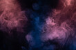 © Nikolay - Blue and pink steam on a black background.