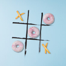 Donuts And French Fries To Play Tic Tac Toe.