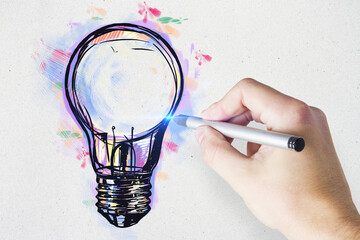 Wall Mural - Hand drawing creative light bulb sketch on concrete wall background. Idea, innovation and inspiration concept.
