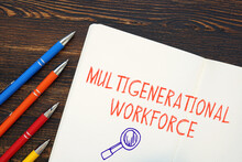 Business Concept Meaning Multigenerational Workforce With Sign On The Piece Of Paper.