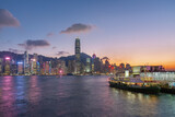 Fototapeta  - Victoria Harbor of Hong Kong city under sunset