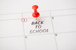 © ActionGP - Closeup photo of mark on calendar at first inscription back to school with red pushpin