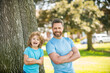 © Olena - dad with kid on summer day. parenting and fatherhood. fathers day. happy father and son
