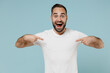 © ViDi Studio - Young surprised amazed happy man 20s wear blank print design white t-shirt point index finger on himself isolated on plain pastel light blue color background studio portrait. People lifestyle concept