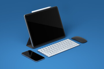 Wall Mural - Computer tablet with keyboard, mouse and phone isolated on blue background.