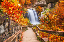 Looking Glass Falls In Pisgah National Forest, North Carolina, USA With Early Autumn Foliage.