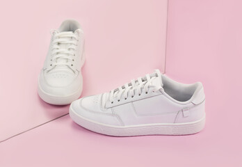 Wall Mural - Sports sneakers on a pink background