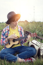 Girl Playing A Guitar