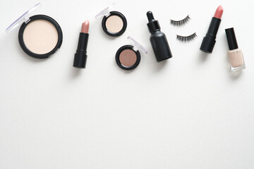 Wall Mural - Frame of makeup cosmetics on white background. Flat lay, top view. Face skin care concept.