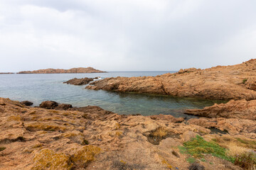 beautiful beach and characteristic reddish rocks of Isola Rossa,  Paradiso. Trinit?� d'Agultu e Vignola, Sardinia, Italy, Europe