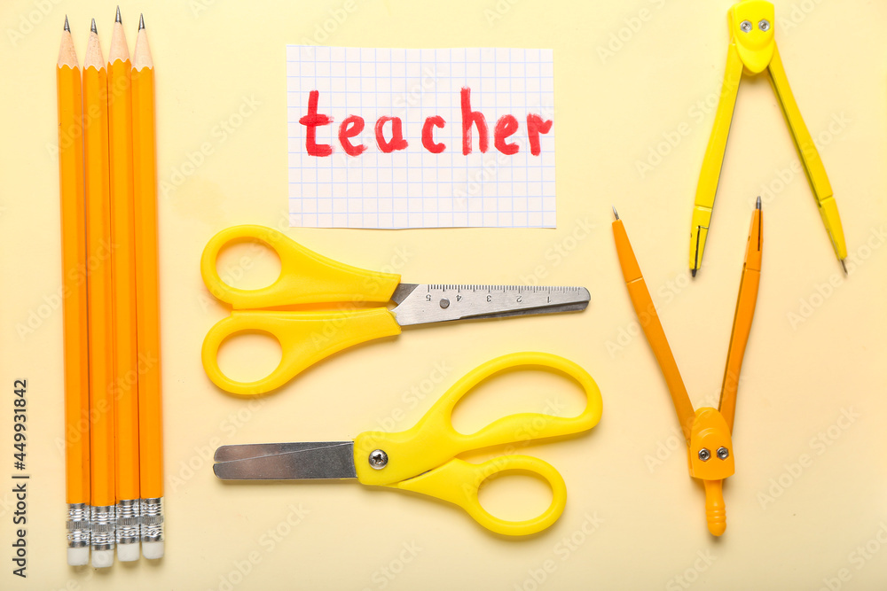 Paper with word TEACHER and stationery on color background