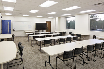 Wall Mural - Interior of modern office business conference room with white tables and black chairs