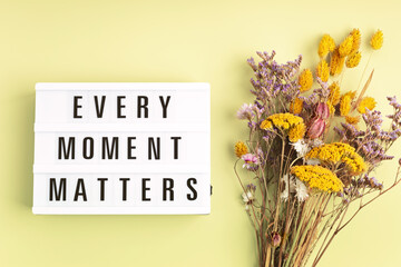Wall Mural - Lightbox with text every moment matters. Mental health, positive thinking, emotional wellness concept