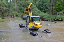 Walking Dredger Working In The River - River Bed Restoration