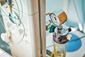 Wall Mural - A device for resuscitation of infants and checking the child on the Apgar scale after delivery. Machine for oxygen supply and resuscitation of the baby after childbirth