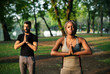 © Rawpixel.com - People yoga in a park