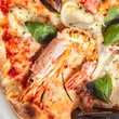 © Ryzhkov - Italian Seafood Pizza with Squid, Mussels and Shrimps