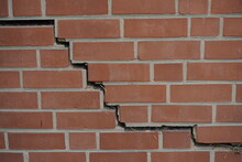 Brick Garage Wall With Cracks, Caused By Subsidence Of The Wall. Hanover, Germany. 