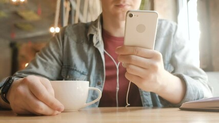 Man typing message with one hand on smart phone