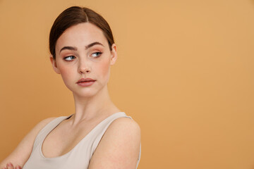 Wall Mural - Close up portrait of a calm young white red haired woman