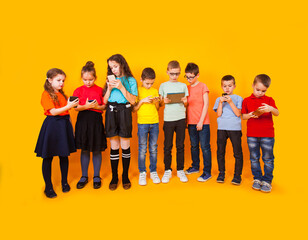  Young kids playing game on mobile phone