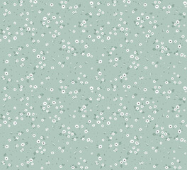 Cute floral pattern in the small flowers. Seamless vector texture. Elegant template for fashion prints. Printing with small white flowers. Pale blue gray  background.