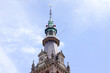 Spire with clock of the tower of the great church in Apeldoorn in the Netherlands