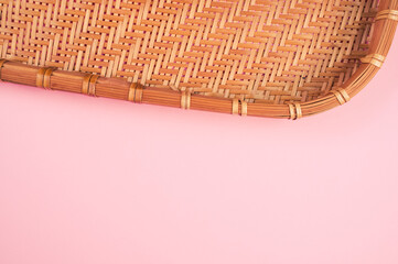 Canvas Print - High angle shot of woven fabric on a pink surface