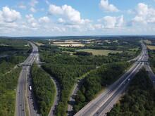 Aerial View Of The M23 & M25 Motorways At The Stack Interchange, Facing South East. 