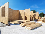 Fototapeta Miasta - Construction of new and modern prefabricated modular house