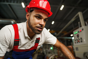 Poster - Portrait of young tired african american workman in cable production plant