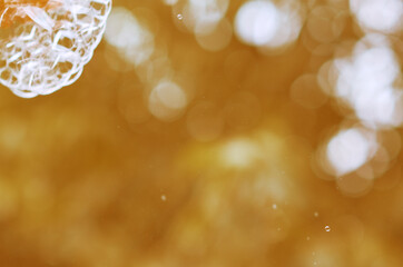 Wall Mural - blurry background with splashes and dust particles