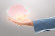 © eddows - Female doctor holding brain illustration against the gray background. Mental health protection and care