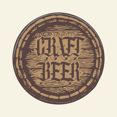 Wall Mural - vector label or sticker for craft beer in the form of a wooden barrel lid with a decorative inscript