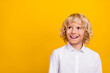 © deagreez - Photo of interested dreamy inspired blond schoolboy look empty space wear uniform isolated yellow color background