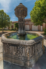 Canvas Print - Fontaine médiévale à Saint-Saturnin, Puy-de-Dôme, France