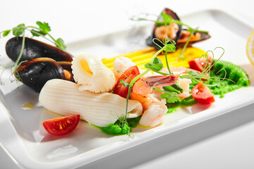 Wall Mural - Blanched seafood, cut tomatoes and lemon