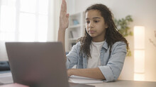 Black Teen Girl Answering Teacher While Having Online Lesson, Distance Learning