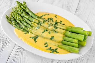 Wall Mural - Cooked asparagus with Hollandaise sauce