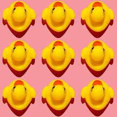  Seamless pattern with rubber duck on pink background.